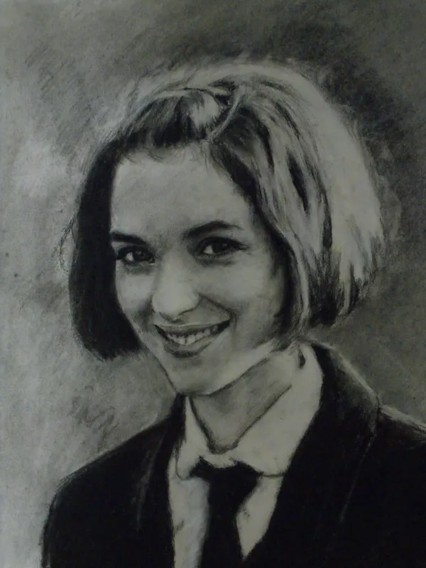 Charcoal portrait of a smiling woman with a bob haircut